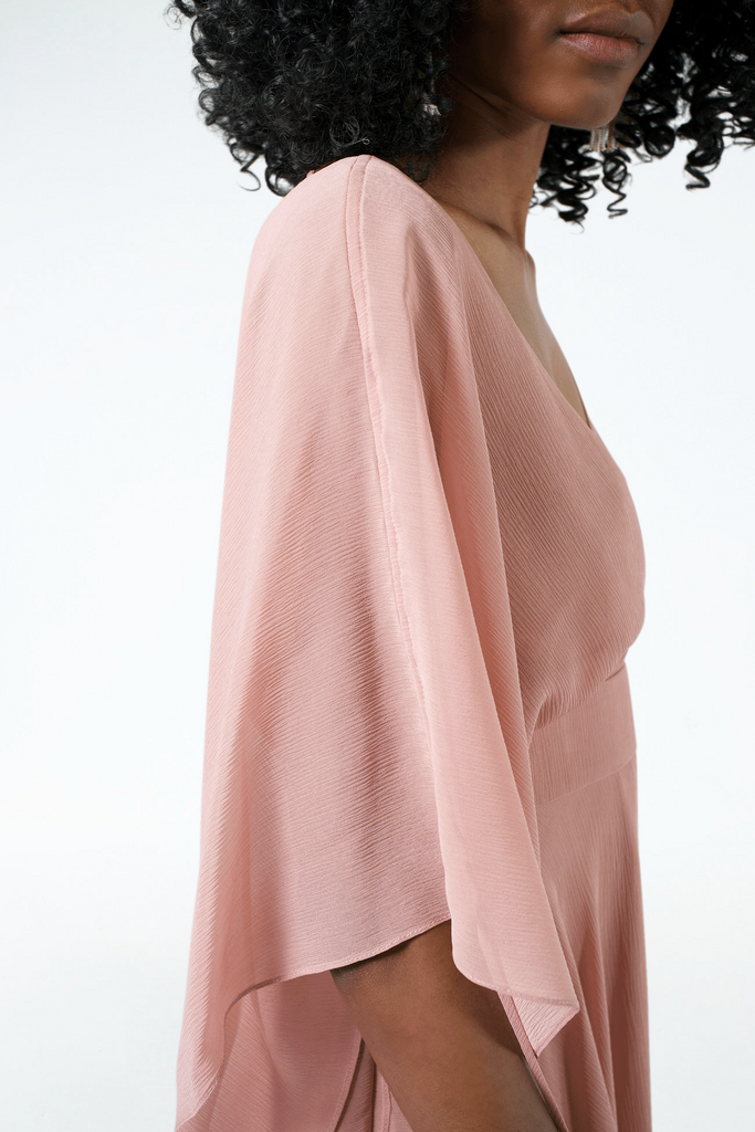 pink crinkle dress with wide and loose sleeves that scrunch up with drawstring