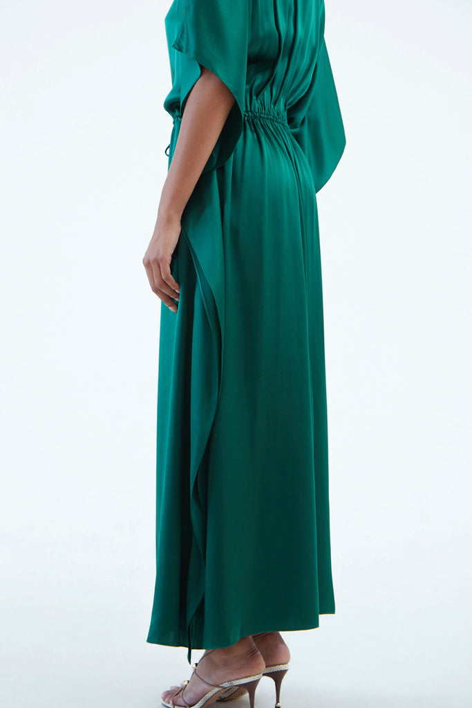 maxi emerald green silk kaftan dress with wide draped elbow-length sleeves, waist tie, and  low V neck